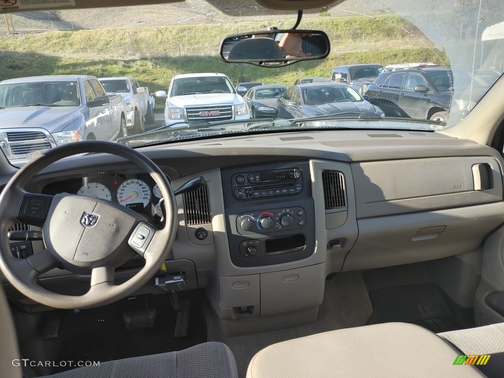 2004 Ram 2500 SLT Quad Cab 4x4 - Patriot Blue Pearl / Taupe photo #8