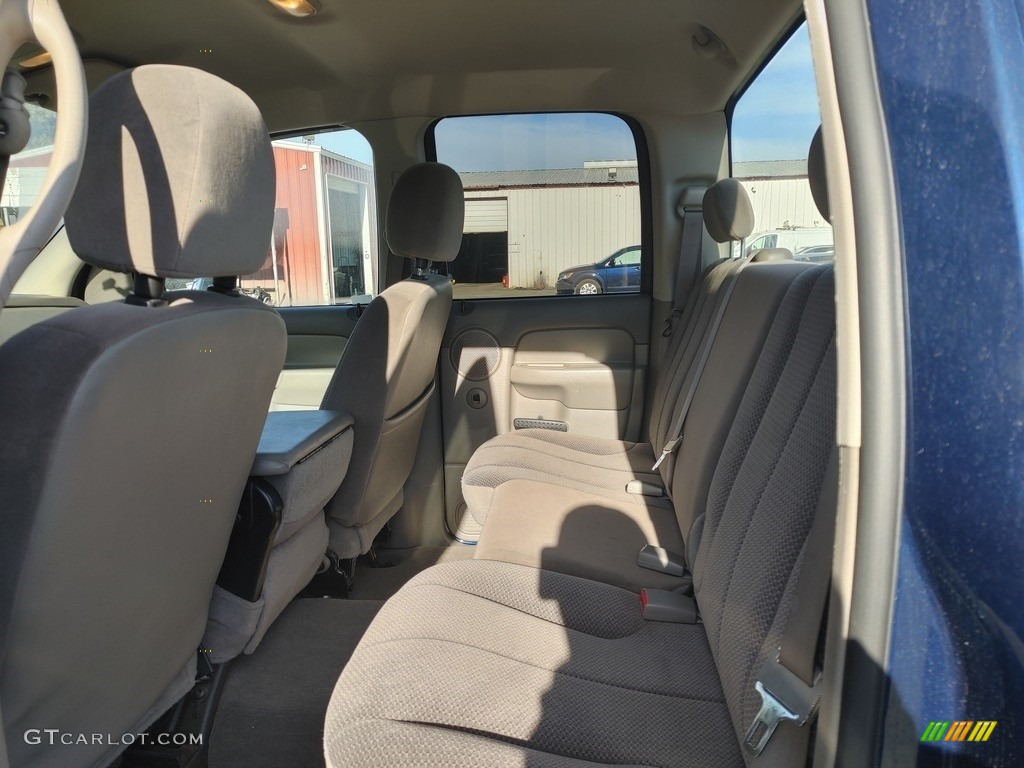 2004 Ram 2500 SLT Quad Cab 4x4 - Patriot Blue Pearl / Taupe photo #9