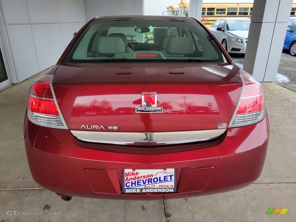 2009 Aura XE - Red Jewel Tintcoat / Gray photo #4