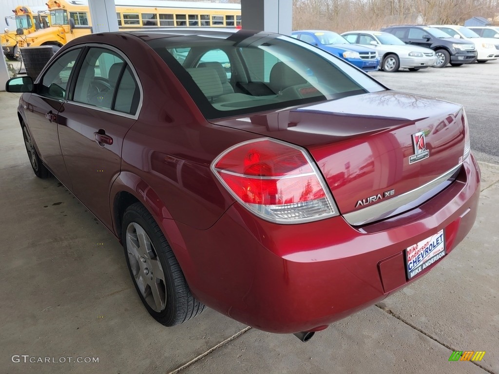 2009 Aura XE - Red Jewel Tintcoat / Gray photo #5