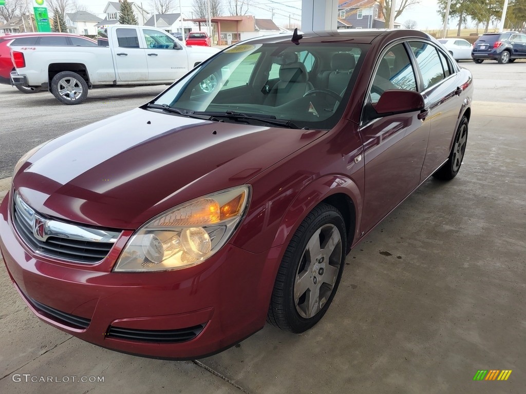 2009 Aura XE - Red Jewel Tintcoat / Gray photo #6