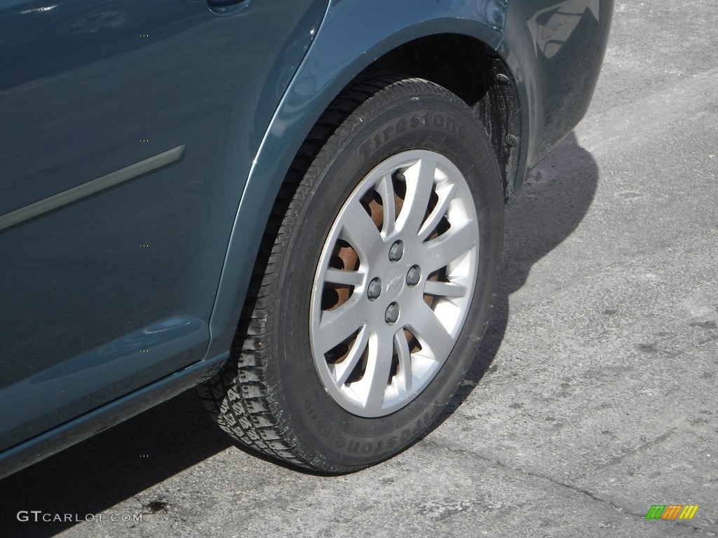 2009 Cobalt LT Sedan - Silver Moss Metallic / Ebony photo #3