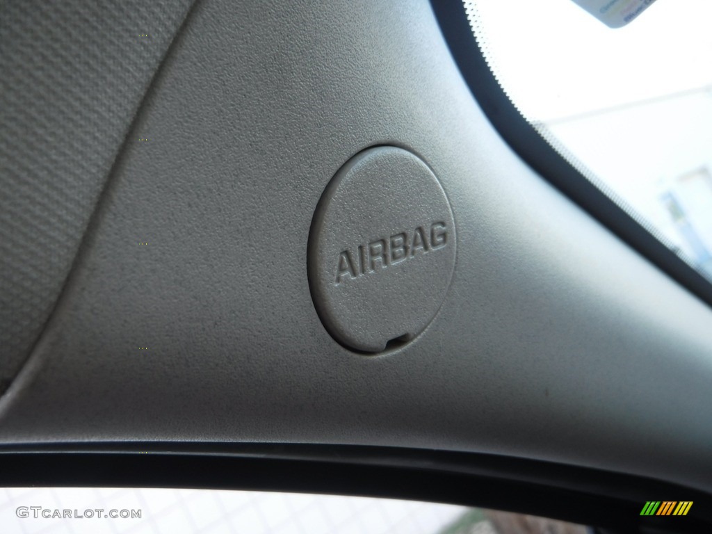 2009 Cobalt LT Sedan - Silver Moss Metallic / Ebony photo #19
