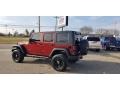 2010 Flame Red Jeep Wrangler Unlimited Sport 4x4  photo #2