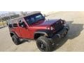 2010 Flame Red Jeep Wrangler Unlimited Sport 4x4  photo #5