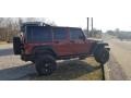 2010 Flame Red Jeep Wrangler Unlimited Sport 4x4  photo #24