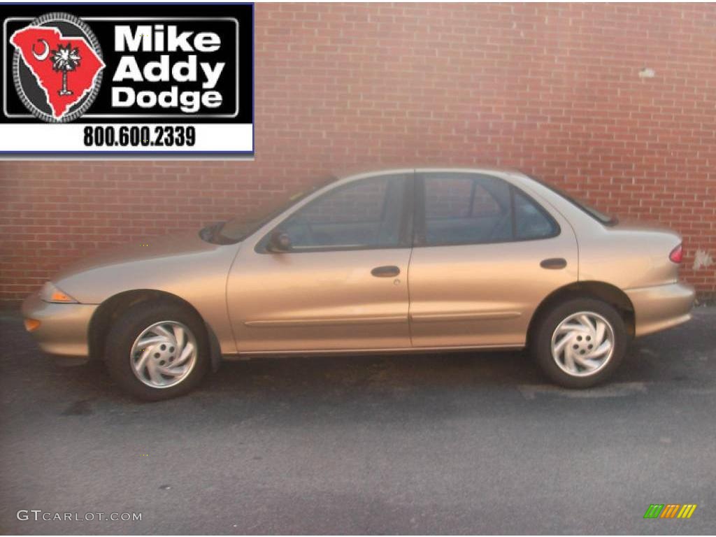 1999 Cavalier Sedan - Medium Sunset Gold Metallic / Neutral photo #1