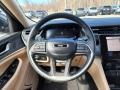 Global Black/Wicker Beige 2022 Jeep Grand Cherokee L Limited 4x4 Steering Wheel