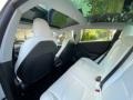 2021 Tesla Model 3 Black Interior Rear Seat Photo