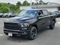 Front 3/4 View of 2022 1500 Big Horn Night Edition Crew Cab 4x4