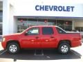 2009 Victory Red Chevrolet Avalanche LS  photo #1