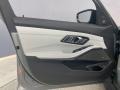 Silverstone/Black 2022 BMW M3 Sedan Door Panel