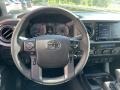2022 Toyota Tacoma Cement/Black Interior Steering Wheel Photo