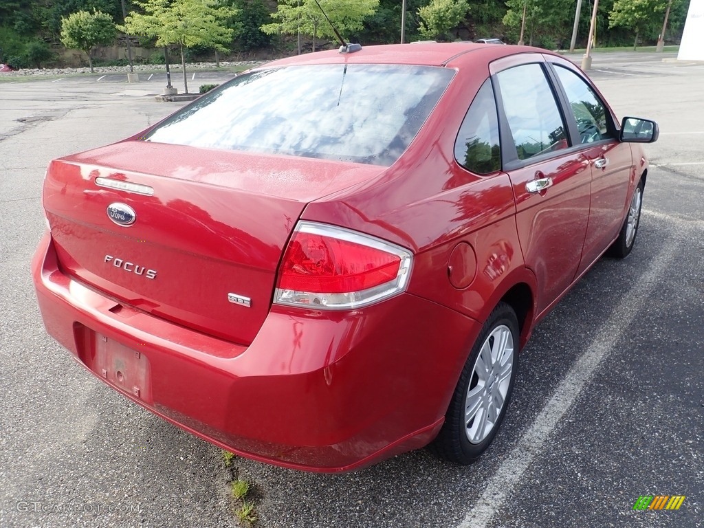 2011 Focus SEL Sedan - Ebony Black / Medium Stone photo #4