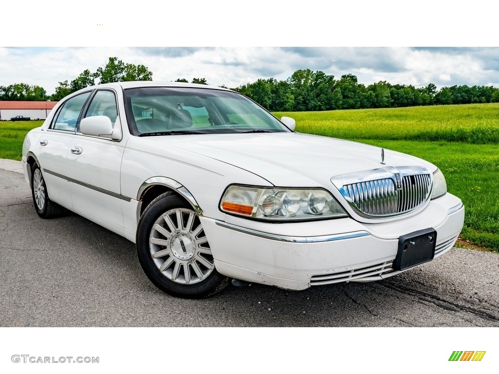 White Pearl Lincoln Town Car