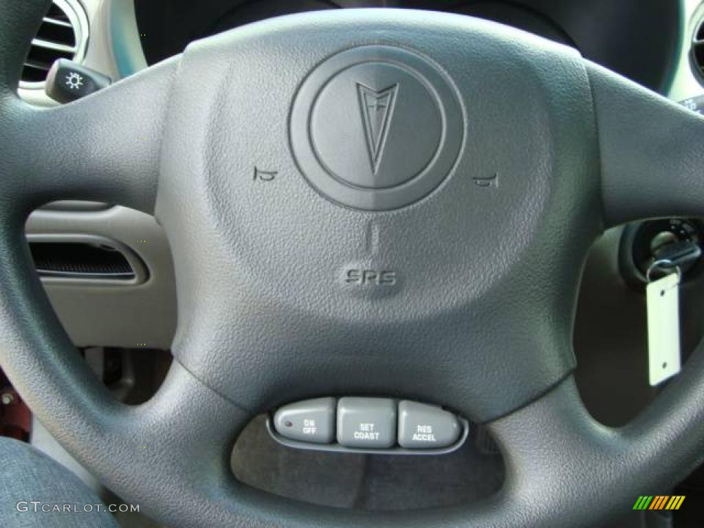 2000 Grand Am SE Sedan - Redfire Metallic / Dark Pewter photo #11