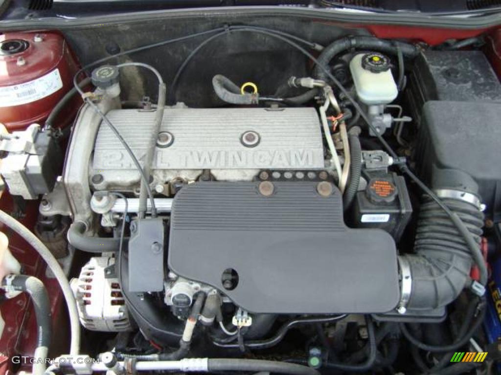 2000 Grand Am SE Sedan - Redfire Metallic / Dark Pewter photo #16