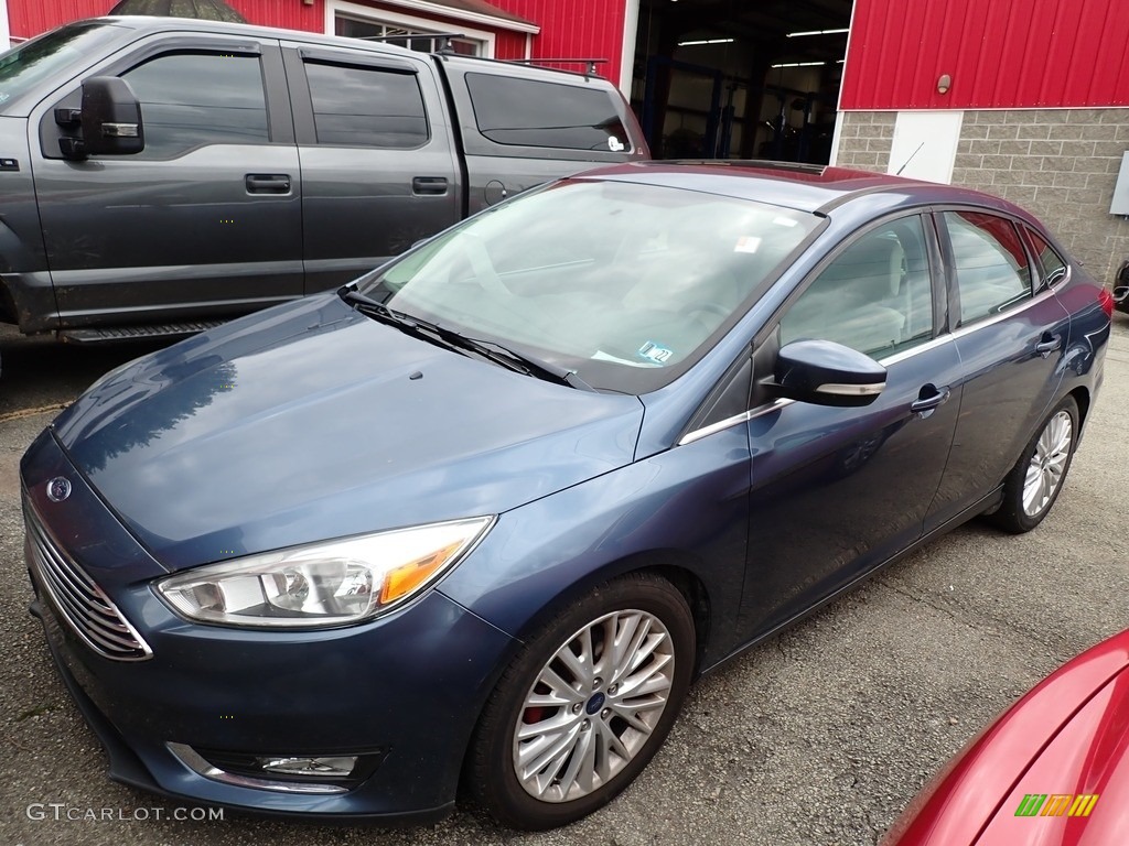 2018 Focus Titanium Sedan - Blue Metallic / Charcoal Black photo #1