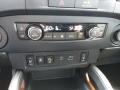 2022 Nissan Frontier Charcoal Interior Controls Photo