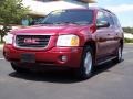 2004 Magnetic Red Metallic GMC Envoy XUV SLT 4x4  photo #5