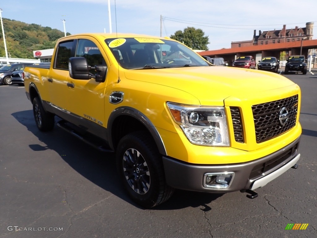 Solar Flare Yellow 2017 Nissan TITAN XD PRO-4X Crew Cab 4x4 Exterior Photo #144772024