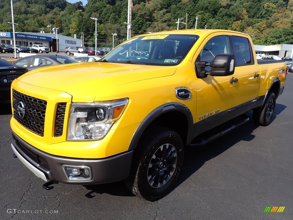 Solar Flare Yellow 2017 Nissan TITAN XD PRO-4X Crew Cab 4x4 Exterior Photo #144772069