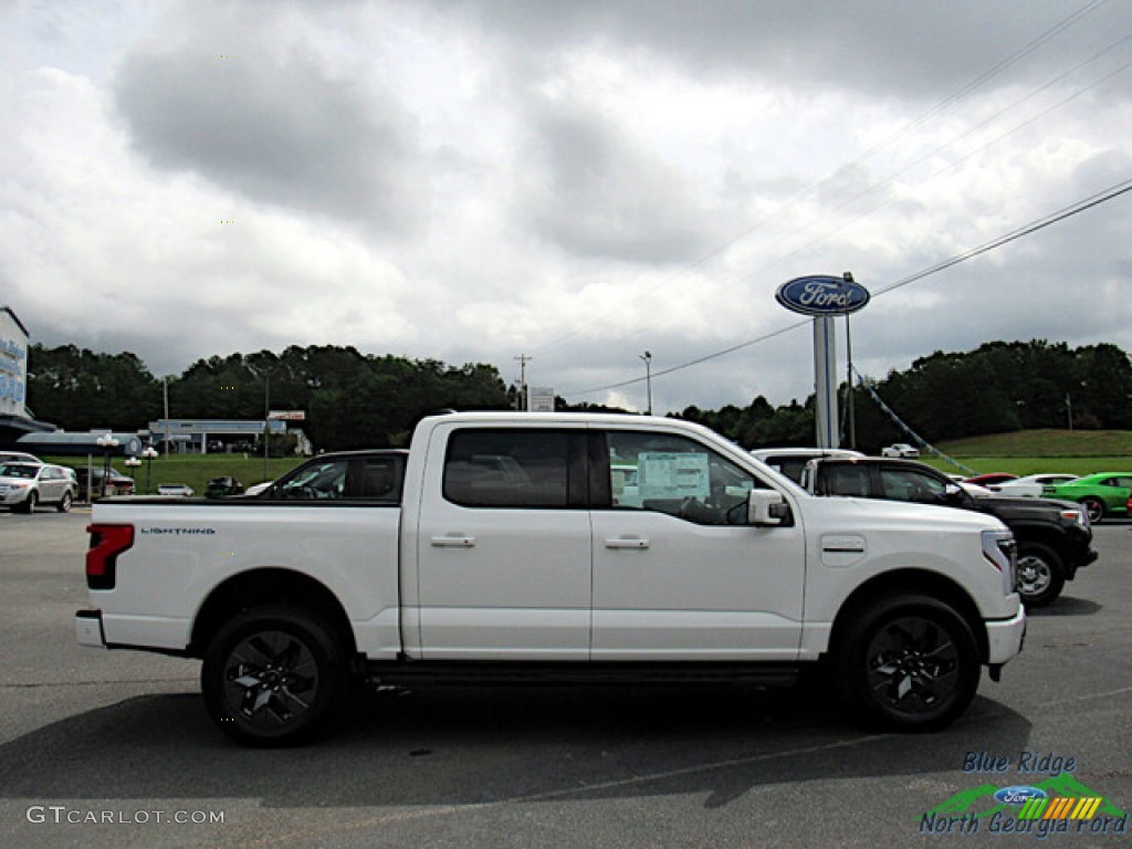 Star White Metallic 2022 Ford F150 Lightning Lariat 4x4 Exterior Photo #144780631