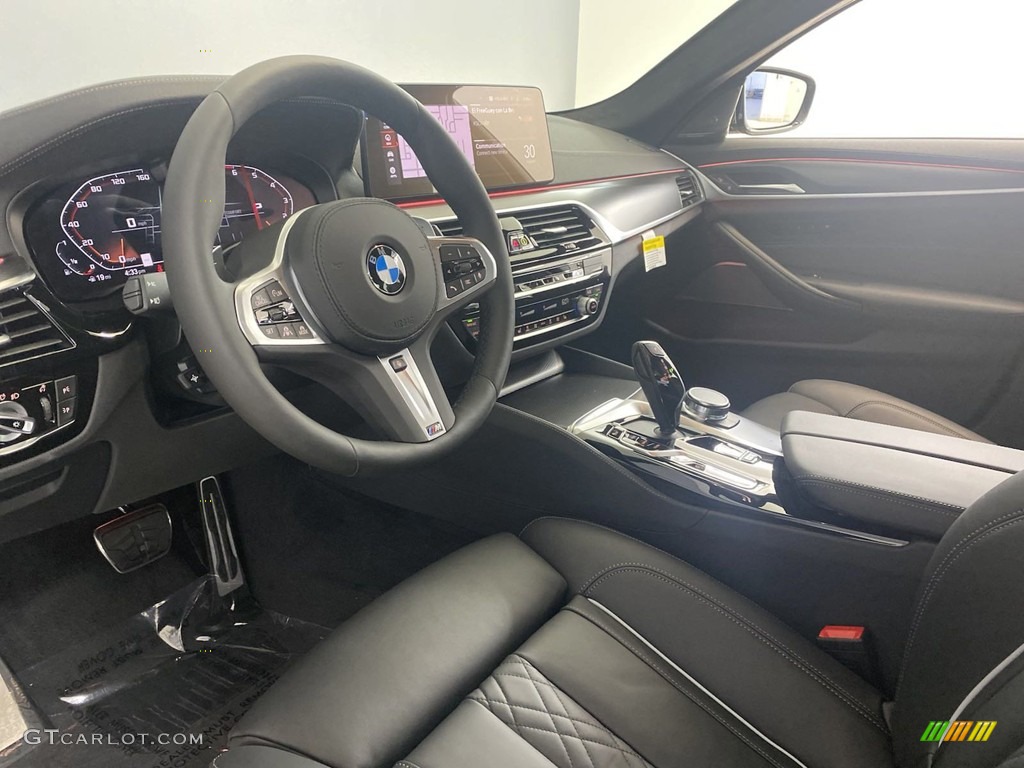 2023 BMW 5 Series M550i xDrive Sedan Front Seat Photo #144800014