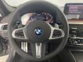 Black 2023 BMW 5 Series M550i xDrive Sedan Steering Wheel