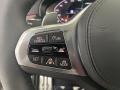 Black 2023 BMW 5 Series M550i xDrive Sedan Steering Wheel