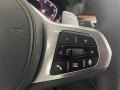 Black 2023 BMW 5 Series M550i xDrive Sedan Steering Wheel
