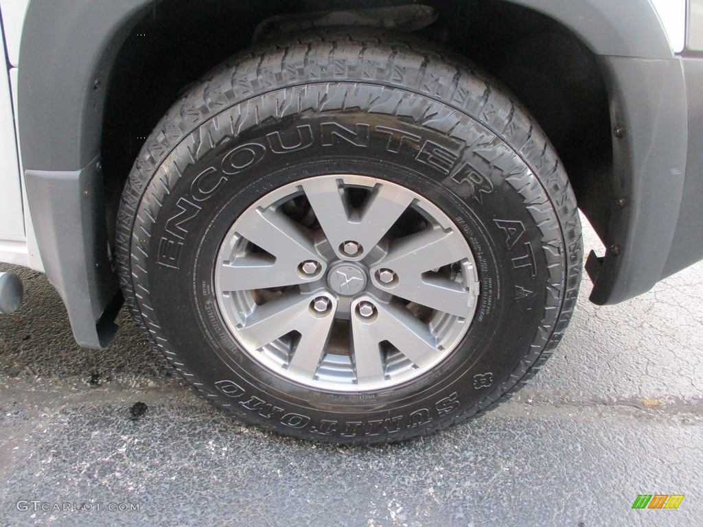 2006 Mitsubishi Raider DuroCross Extended Cab 4x4 Wheel Photo #144907894