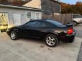 2003 Black Ford Mustang V6 Coupe  photo #9