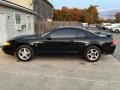 2003 Black Ford Mustang V6 Coupe  photo #10