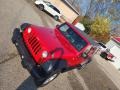 2010 Flame Red Jeep Wrangler Unlimited Sport 4x4  photo #23