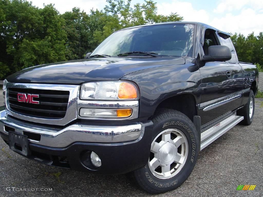 2004 Sierra 1500 SLE Extended Cab 4x4 - Carbon Metallic / Pewter photo #1