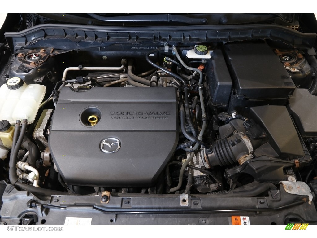 2010 MAZDA3 i Touring 4 Door - Black Mica / Black photo #19