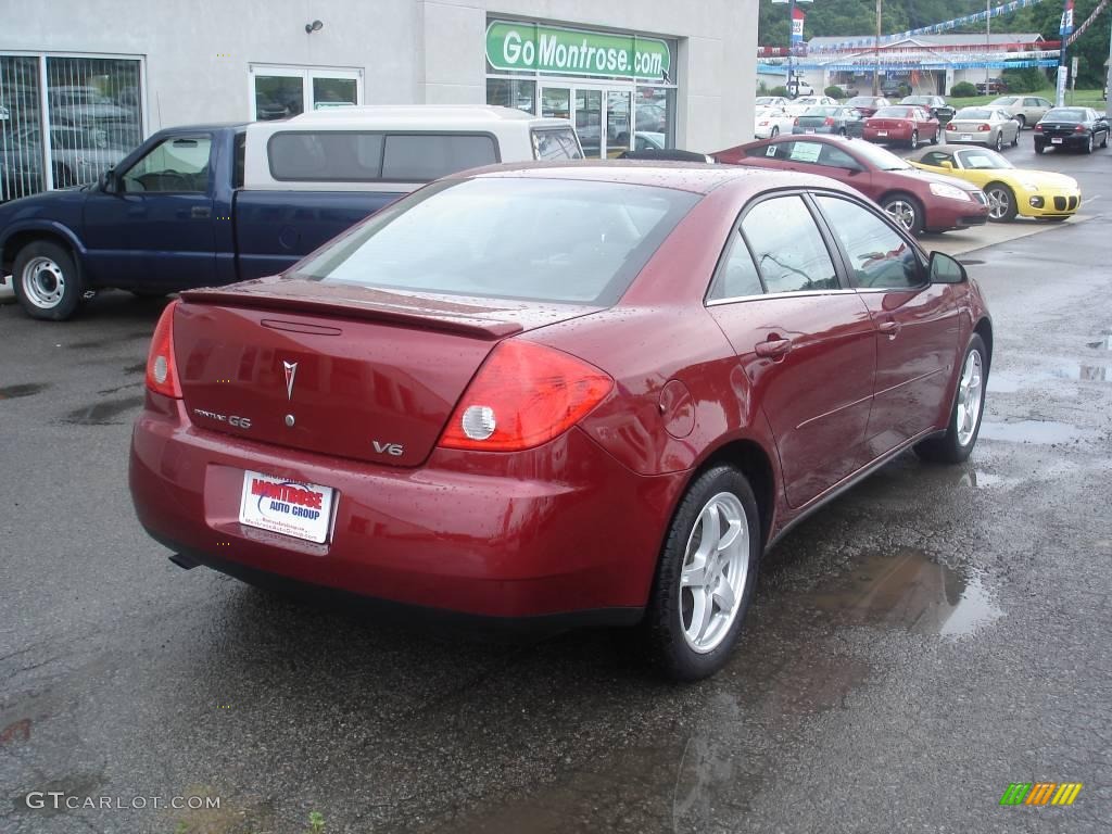 2009 G6 V6 Sedan - Performance Red Metallic / Ebony photo #3
