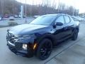 Front 3/4 View of 2023 Santa Cruz Night Edition AWD