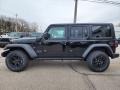 Black 2023 Jeep Wrangler Unlimited Willys 4XE Hybrid Exterior