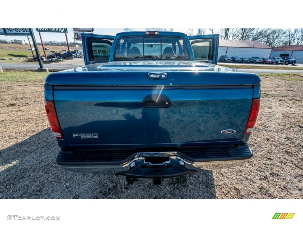 2000 F250 Super Duty XLT Crew Cab 4x4 - Island Blue Metallic / Medium Graphite photo #21