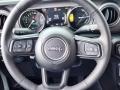 Black 2023 Jeep Wrangler Unlimited Willys 4XE Hybrid Steering Wheel