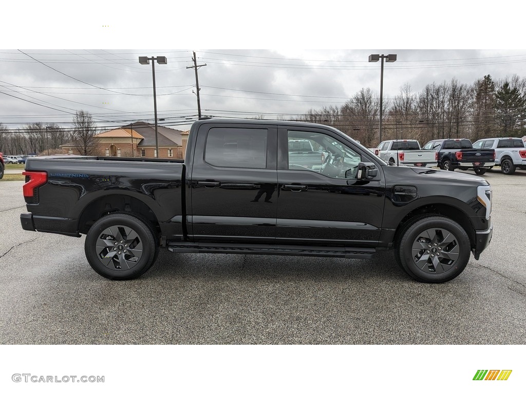 Agate Black Metallic 2023 Ford F150 Lightning Lariat 4x4 Exterior Photo #145512069