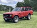 309 - Freeborn Red Toyota Land Cruiser (1983)