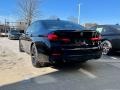 2023 Black Sapphire Metallic BMW 5 Series M550i xDrive Sedan  photo #2