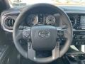 Black/Cement Steering Wheel Photo for 2023 Toyota Tacoma #145622261