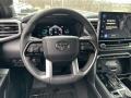 Black 2023 Toyota Tundra Platinum CrewMax 4x4 Steering Wheel