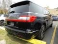Infinite Black - Navigator L Reserve 4x4 Photo No. 3