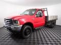 2002 Vermillion Red Ford F450 Super Duty Regular Cab 4x4 Stake Truck  photo #2