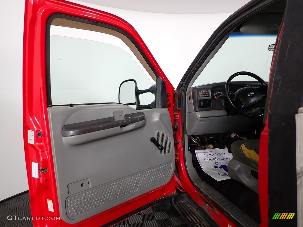 2002 F450 Super Duty Regular Cab 4x4 Stake Truck - Vermillion Red / Medium Graphite photo #6